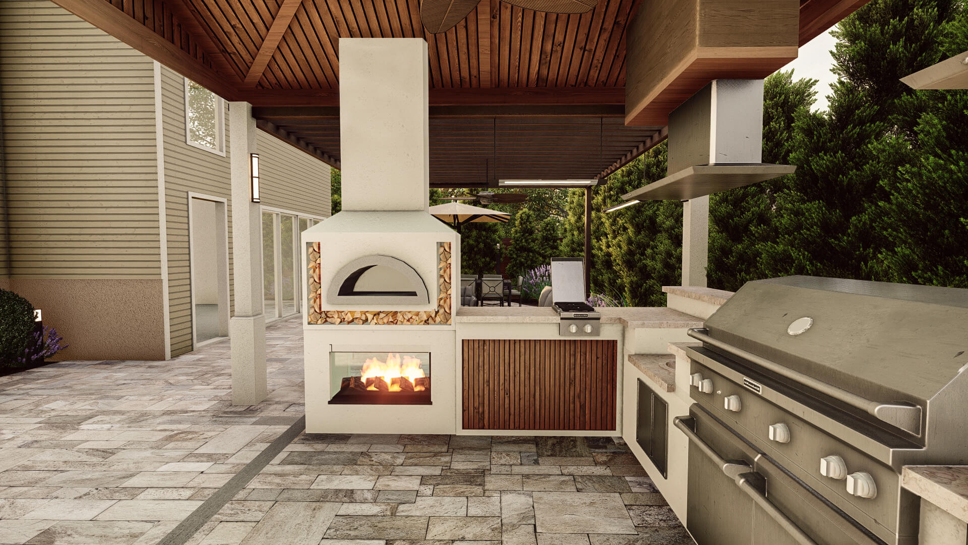 Mediterranean-style outdoor kitchen with a wood-fired pizza oven, built-in grill, and modern amenities set in a cozy patio.