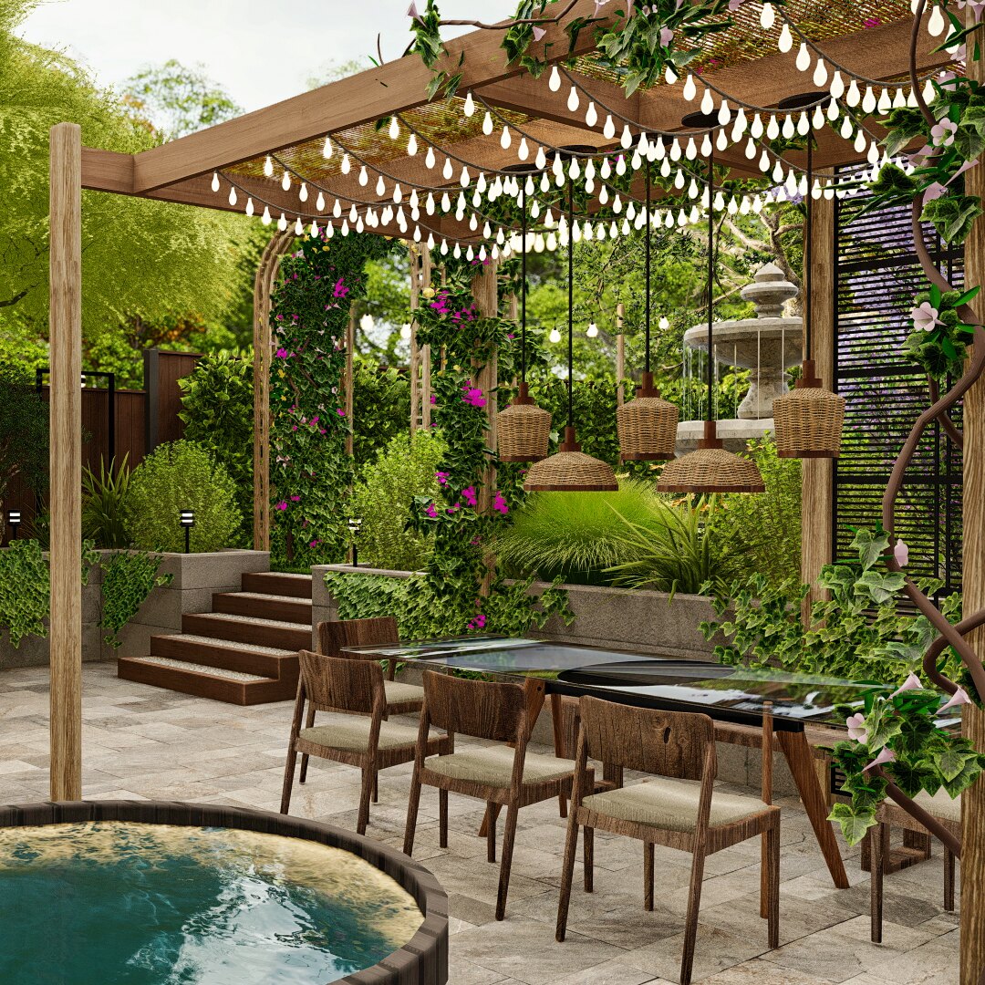 Cozy backyard dining area under a pergola adorned with hanging lights, surrounded by lush greenery and blooming flowers